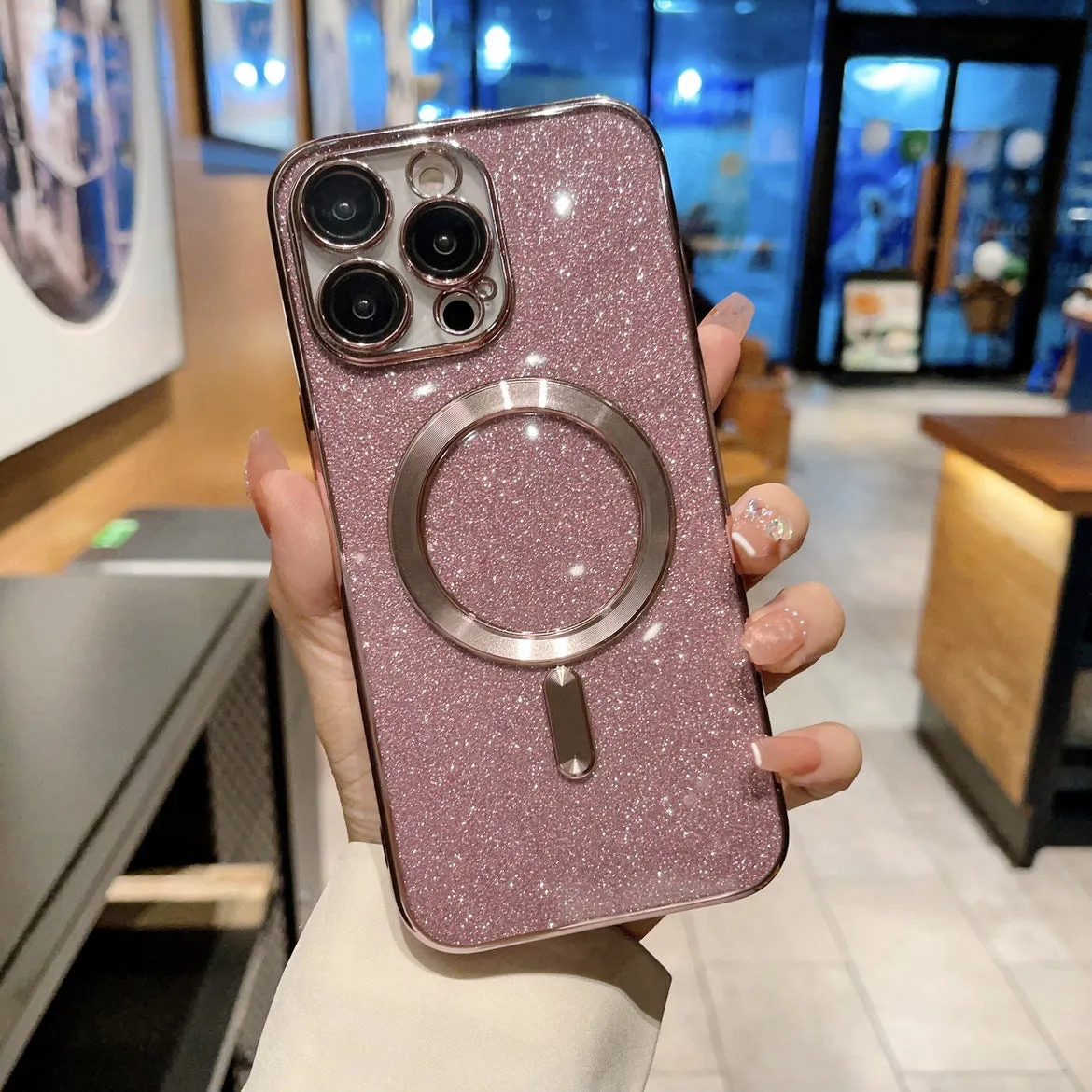 Transparent magnetic TPU phone case for iPhone, showing coloured edges in blue, with raised camera bezel