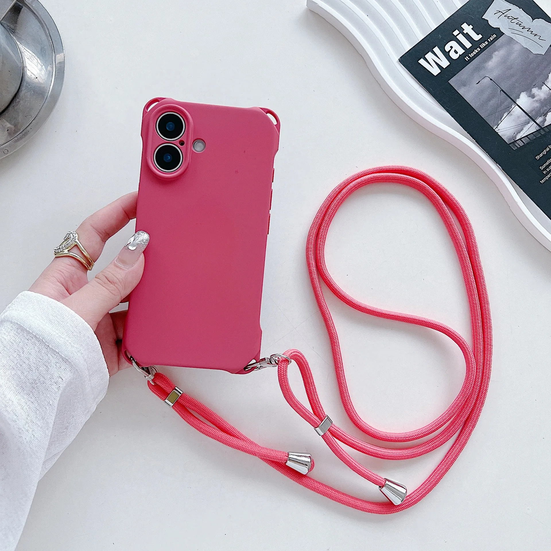 Four-corner cross lanyard liquid silicone phone case for Apple iPhone 16, soft anti-fall, antique white colour