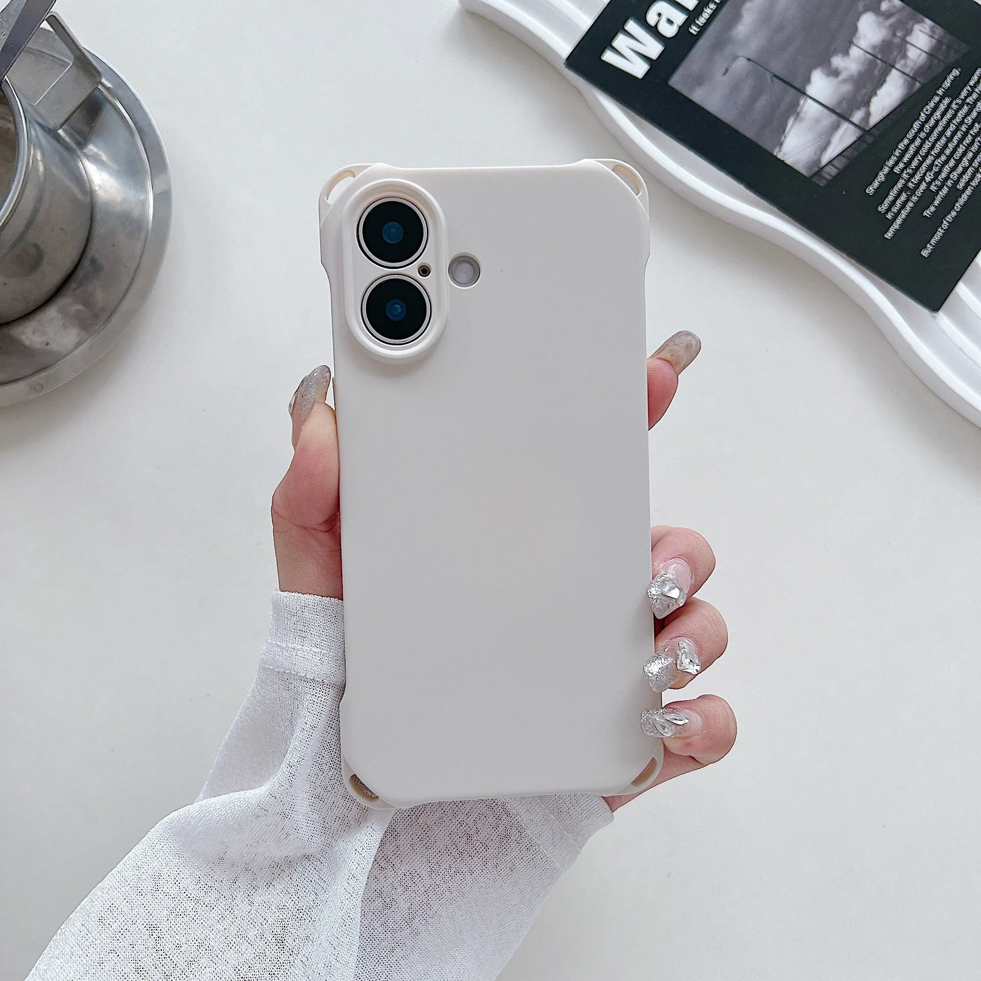 Four-corner cross lanyard liquid silicone phone case for Apple iPhone 16, soft anti-fall, antique white colour