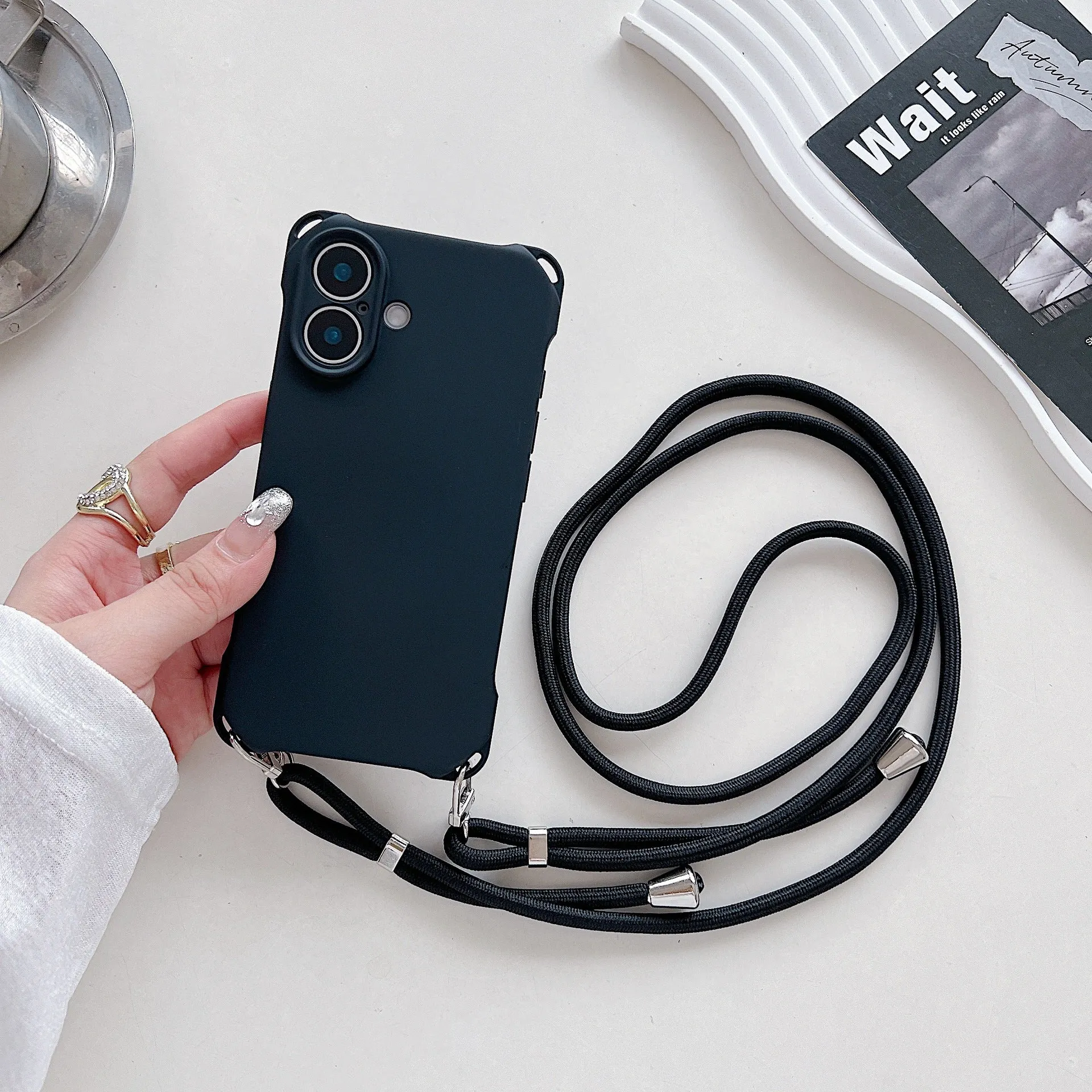 Four-corner cross lanyard liquid silicone phone case for Apple iPhone 16, soft anti-fall, antique white colour