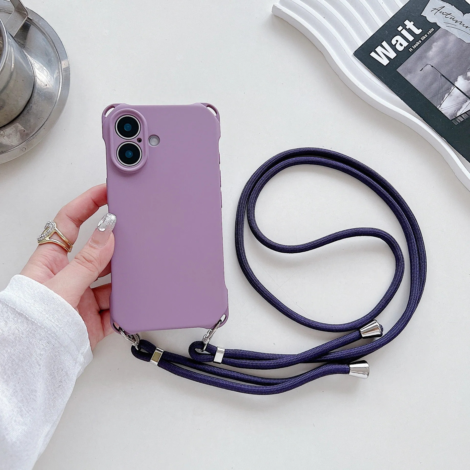 Four-corner cross lanyard liquid silicone phone case for Apple iPhone 16, soft anti-fall, antique white colour