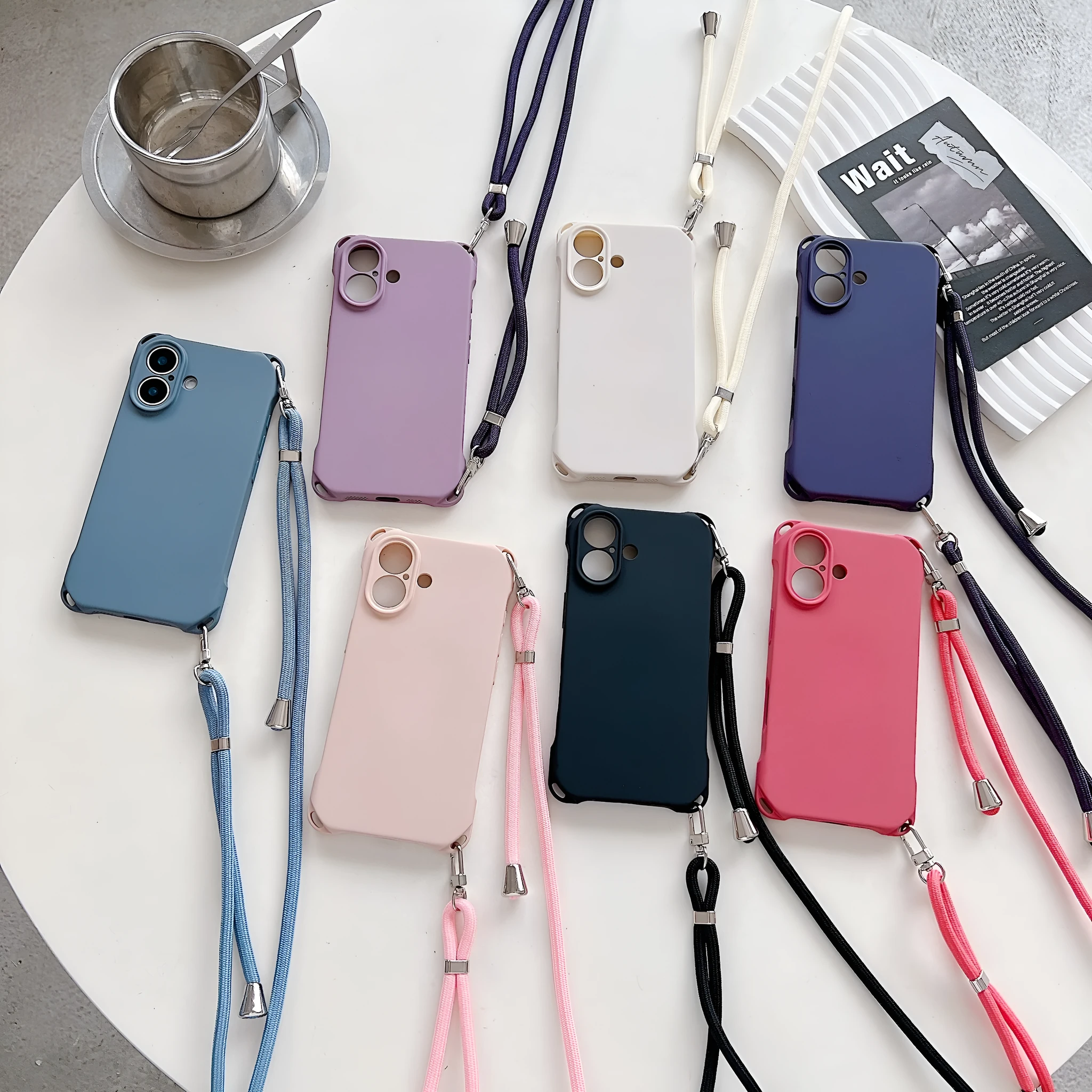 Four-corner cross lanyard liquid silicone phone case for Apple iPhone 16, soft anti-fall, antique white colour