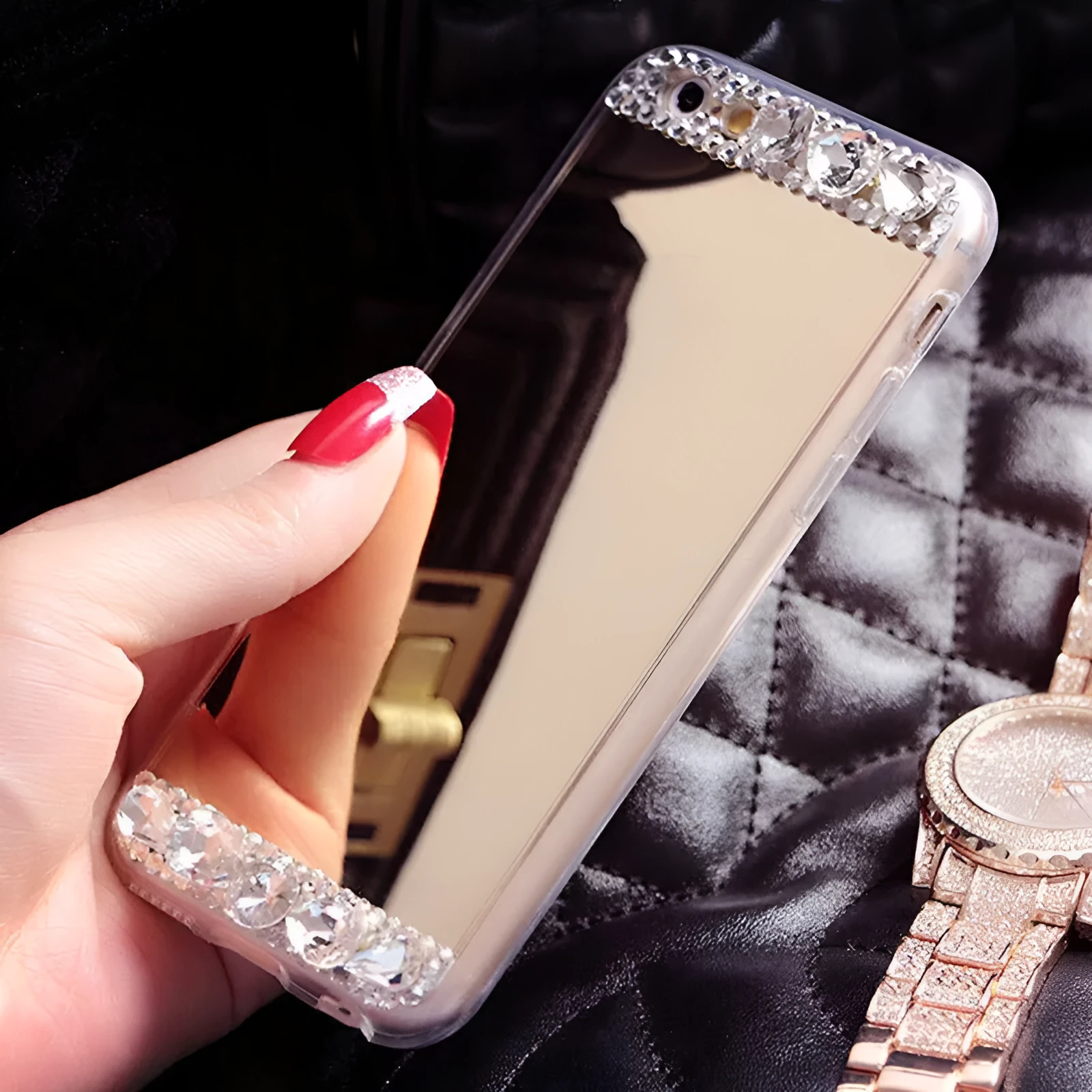 Gold rhinestone decorative silicone back cover case for a Huawei smartphone on a table.