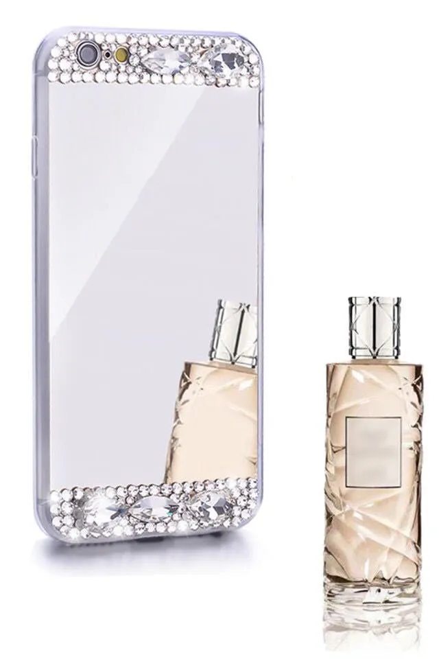 Gold rhinestone decorative silicone back cover case for a Huawei smartphone on a table.