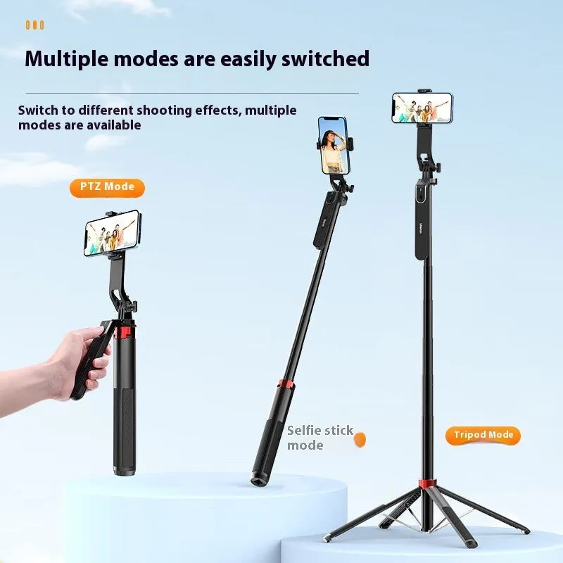 Bluetooth quadrupod selfie stick tripod with remote control, phone clamp, and four legs extended on a table