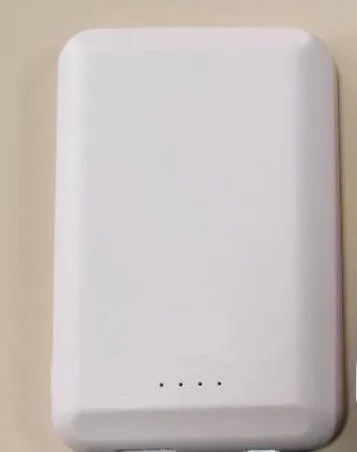 Magnetic wireless power bank in various colours showing magnetising side and plastic shell.