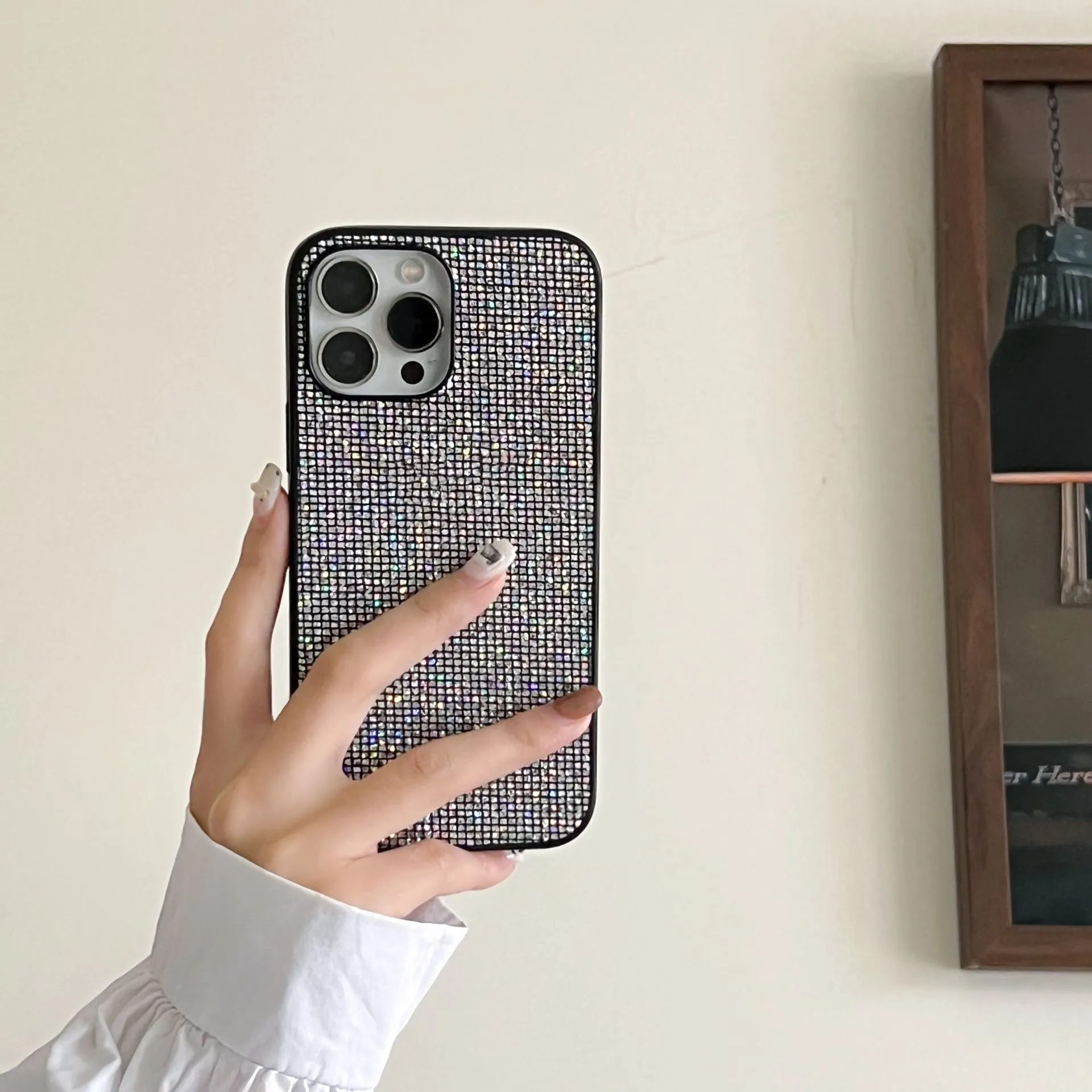 Creative rhinestone phone case in black with matte PC finish for iPhone 16 Pro Max