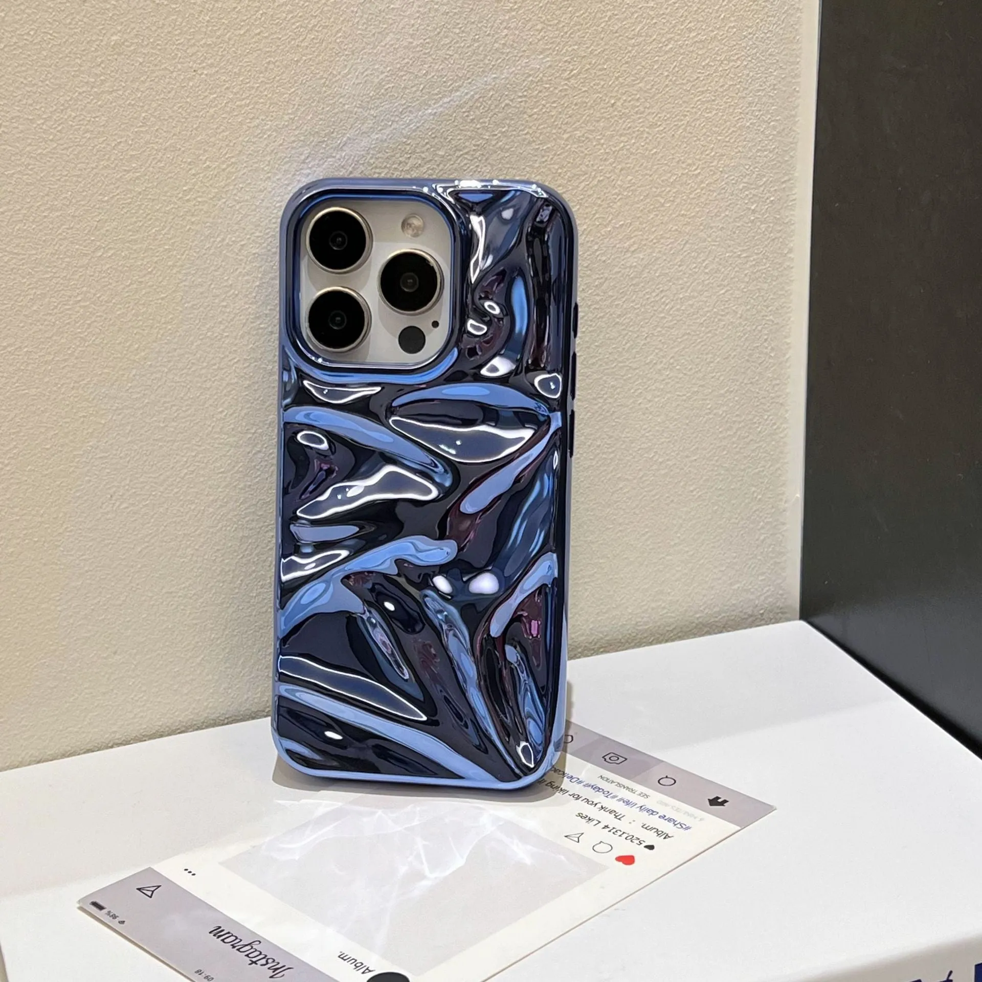 Electroplated three-dimensional pleated TPU phone case for iPhone 11–16 Pro Max in milk blue colour