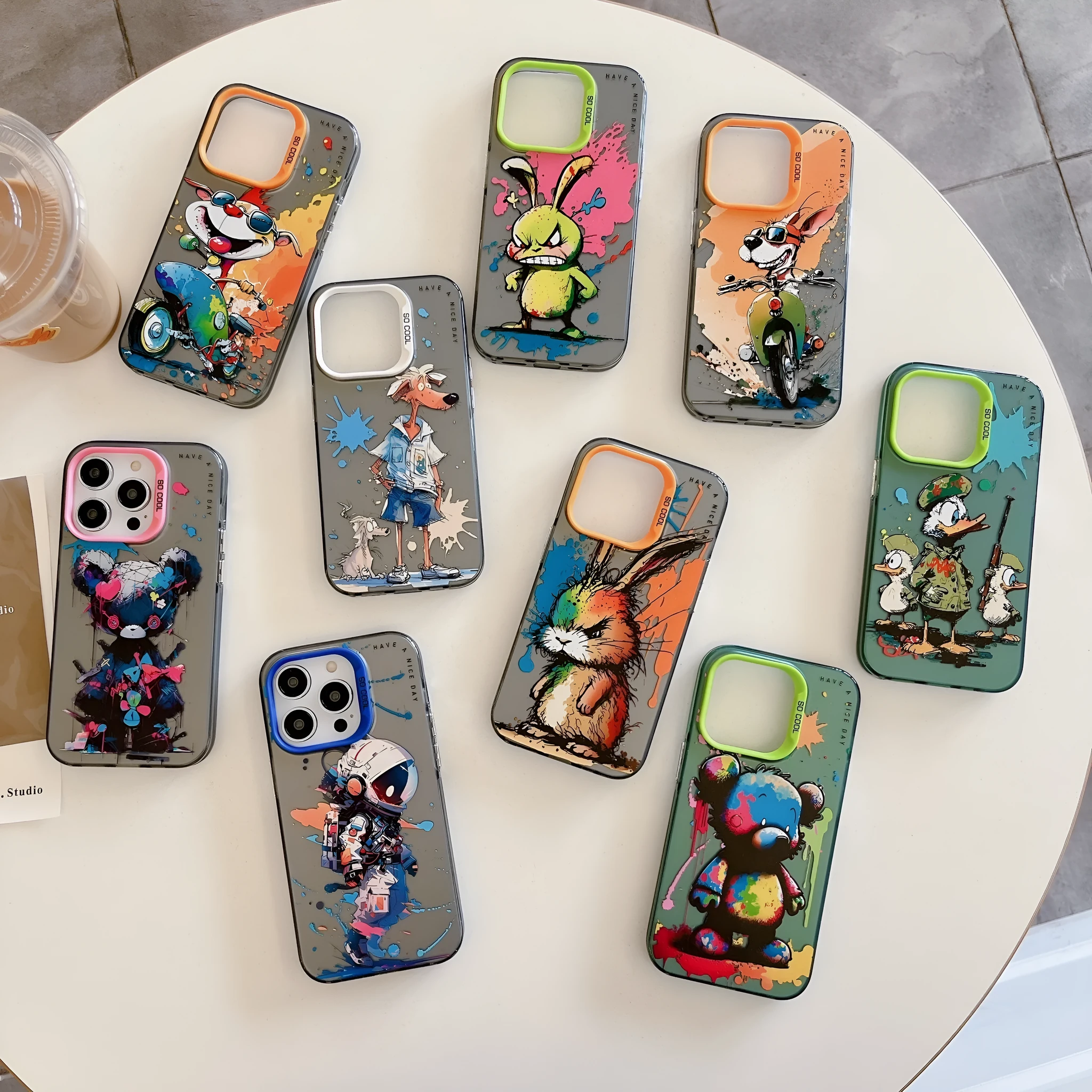 Drop-resistant TPU PC phone case for iPhone featuring an Astronaut colour design with raised edges for screen and lens protection