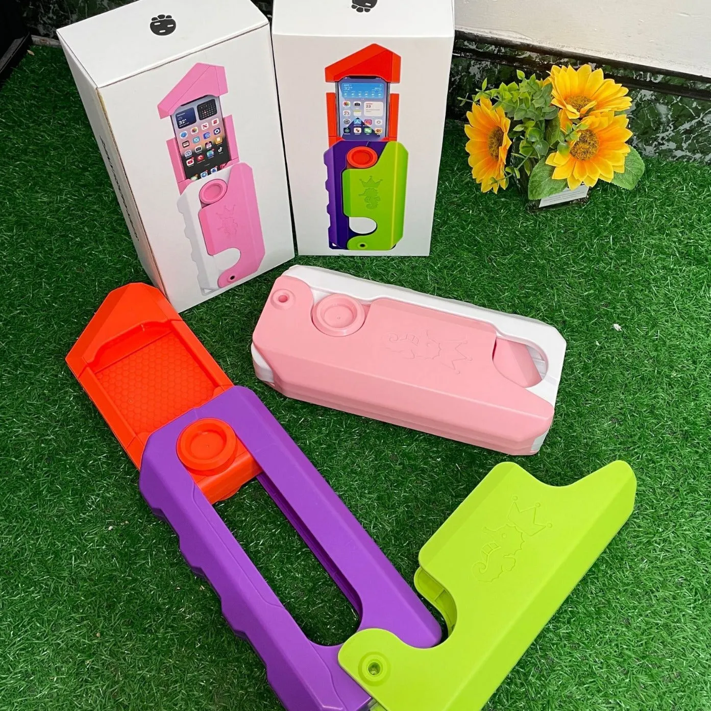 Pink White plastic phone case with built-in decompression toy featuring radish knife design