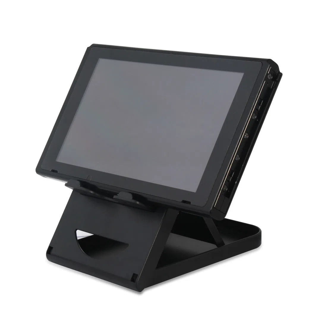 Black adjustable ABS game console stand for Switch on a desktop surface
