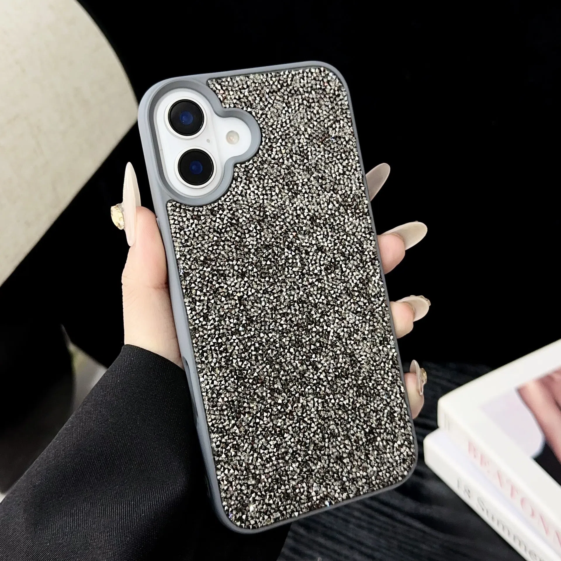 Luxury full diamond handmade phone case for iPhone 17 series in black colour option showing diamond surface texture