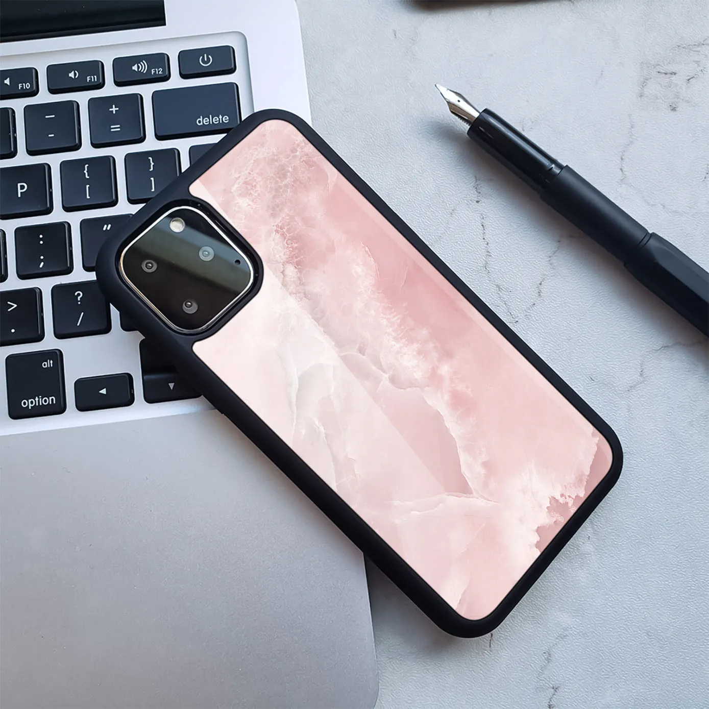 Marbled pattern Huawei smartphone case in TPU and PC materials showing colour variations