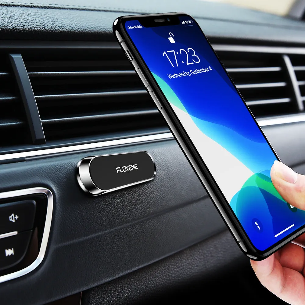 Black magnetic car phone holder with silver iron plate and foam adhesive for dashboard or windscreen mounting