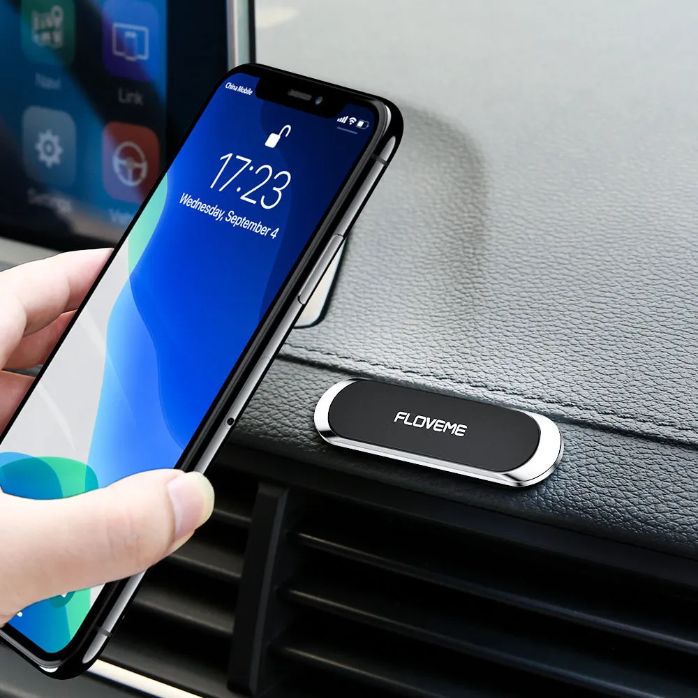 Black magnetic car phone holder with silver iron plate and foam adhesive for dashboard or windscreen mounting