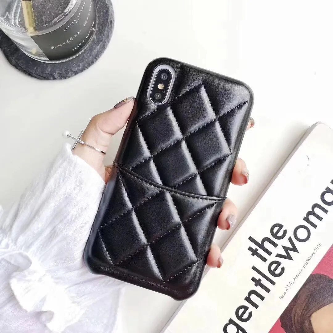 Black leather phone case for iPhone XS Max on a table