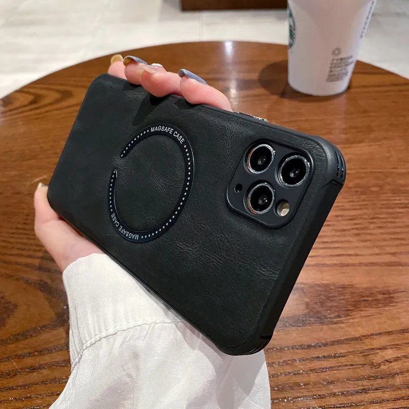 Black imitation leather magnetic charging case for iPhone on a magnetic charging puck