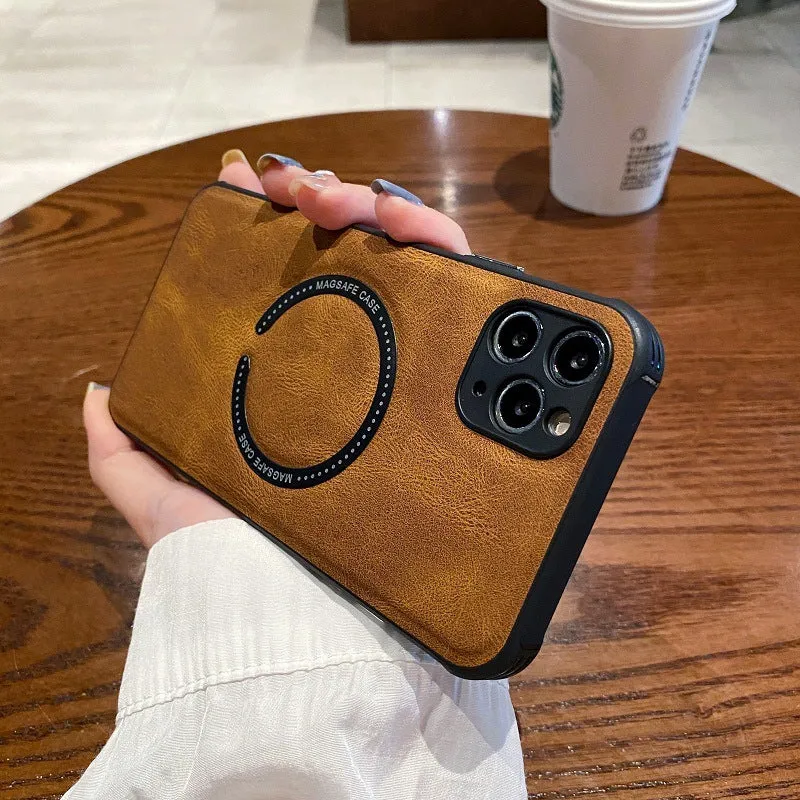 Black imitation leather magnetic charging case for iPhone on a magnetic charging puck