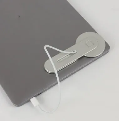 Aluminium alloy magnetic desktop expansion bracket for notebook computers measuring 130x56x6mm