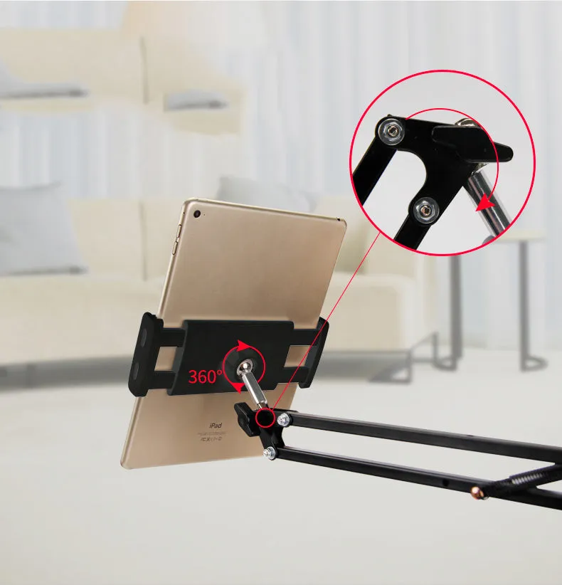 Black and white phone tablet stand on desk holding mobile device