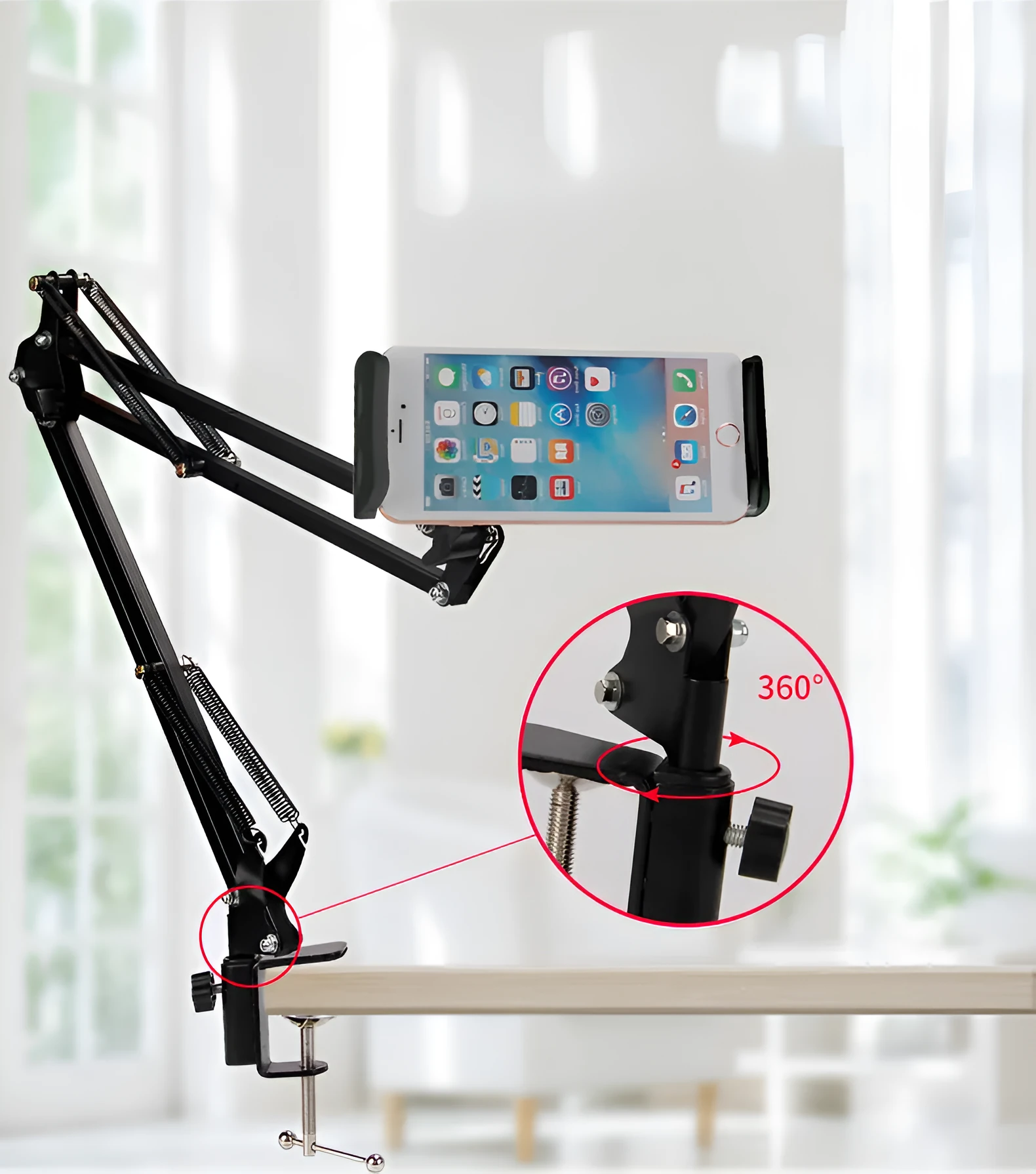 Black and white phone tablet stand on desk holding mobile device