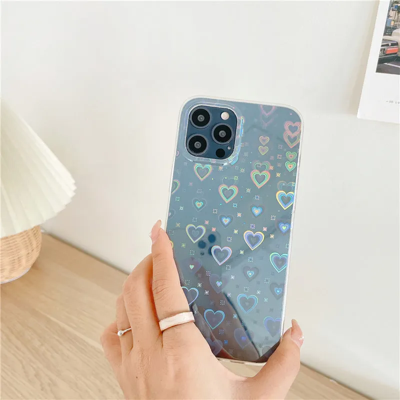 Transparent silicone iPhone case with laser colourful love heart design on the back.