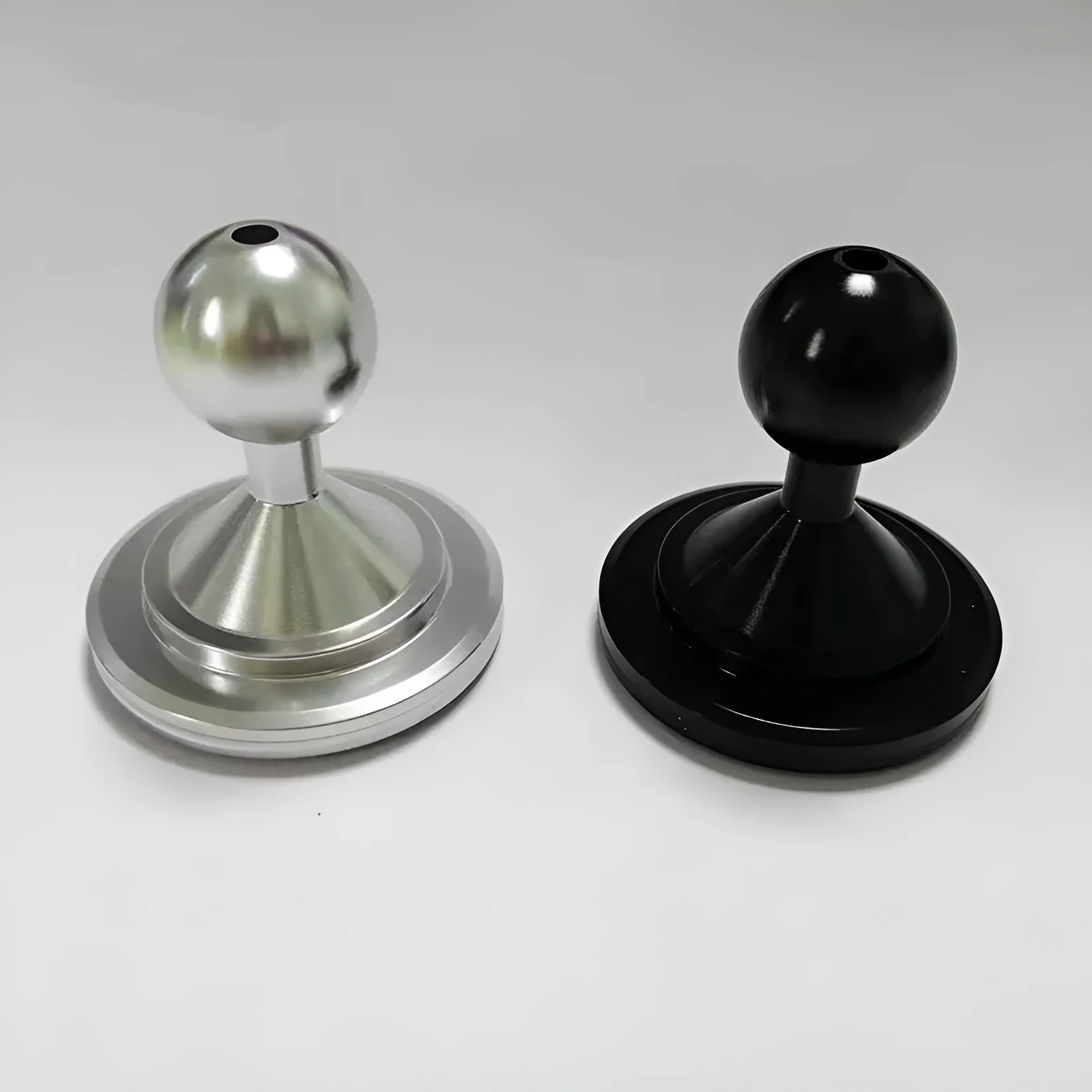 Silver and black aluminium alloy universal instrument panel mounting base plate.