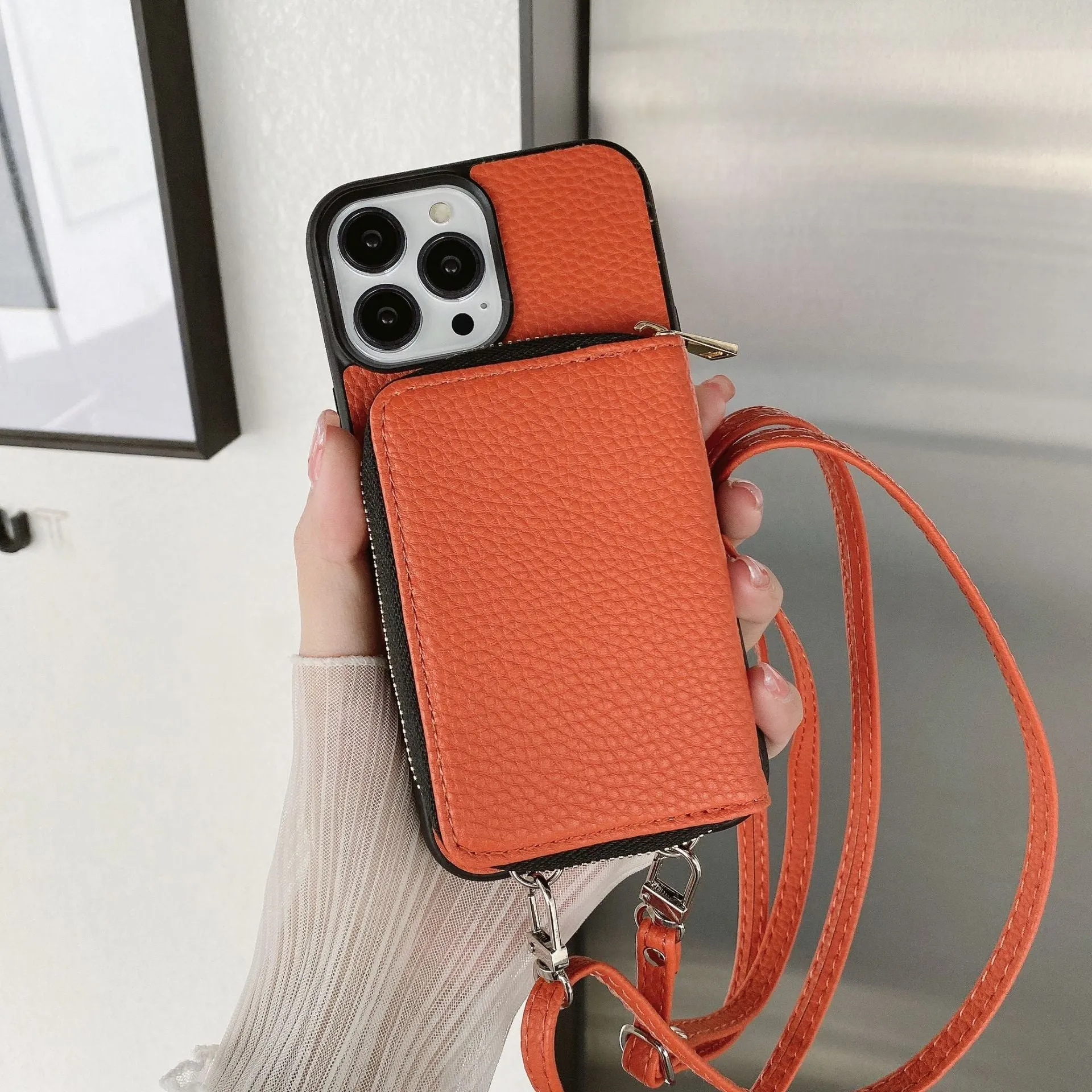 Litchi pattern phone case for iPhone in PC and leather, shown in blue colour.