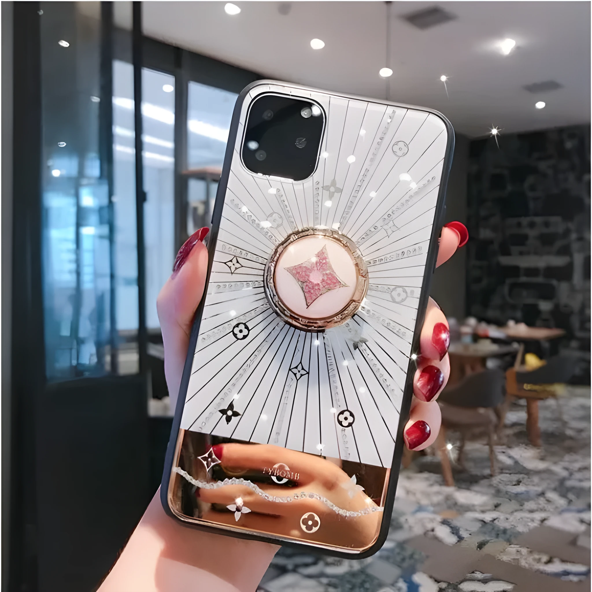 Rose gold and white diamond ring phone stands attached to iPhones, showing grip and kickstand functions.