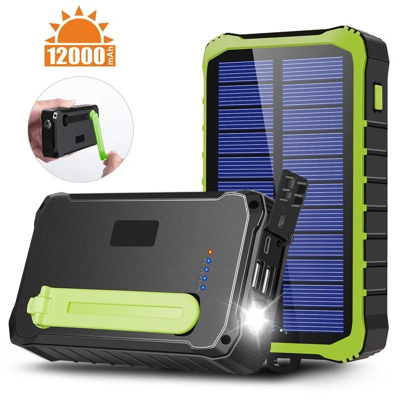 Green and orange hand solar power bank with solar panel, hand crank, and dual USB ports.