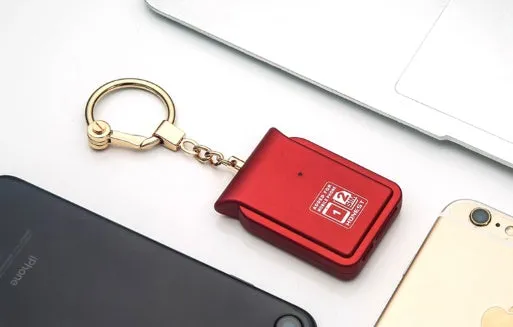 Bluetooth dual SIM adapter keychain for iOS devices with NANO SIM slot and USB charging port