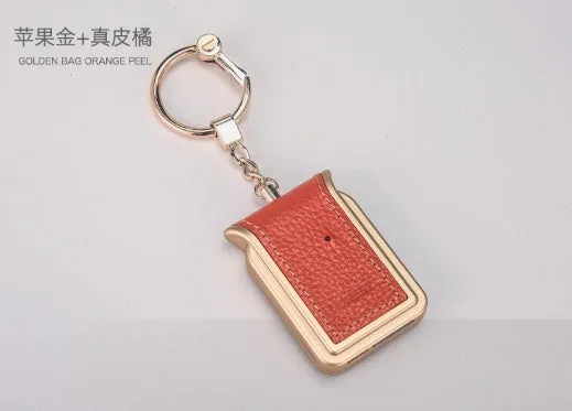 Bluetooth dual SIM adapter keychain for iOS devices with NANO SIM slot and USB charging port