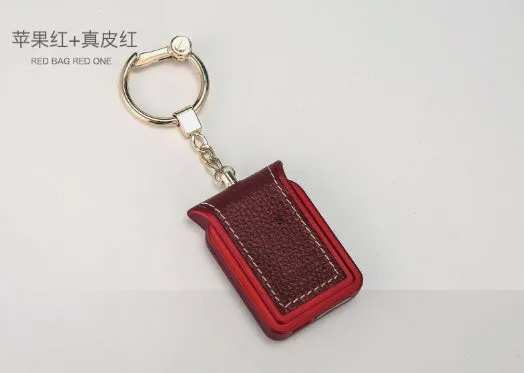 Bluetooth dual SIM adapter keychain for iOS devices with NANO SIM slot and USB charging port