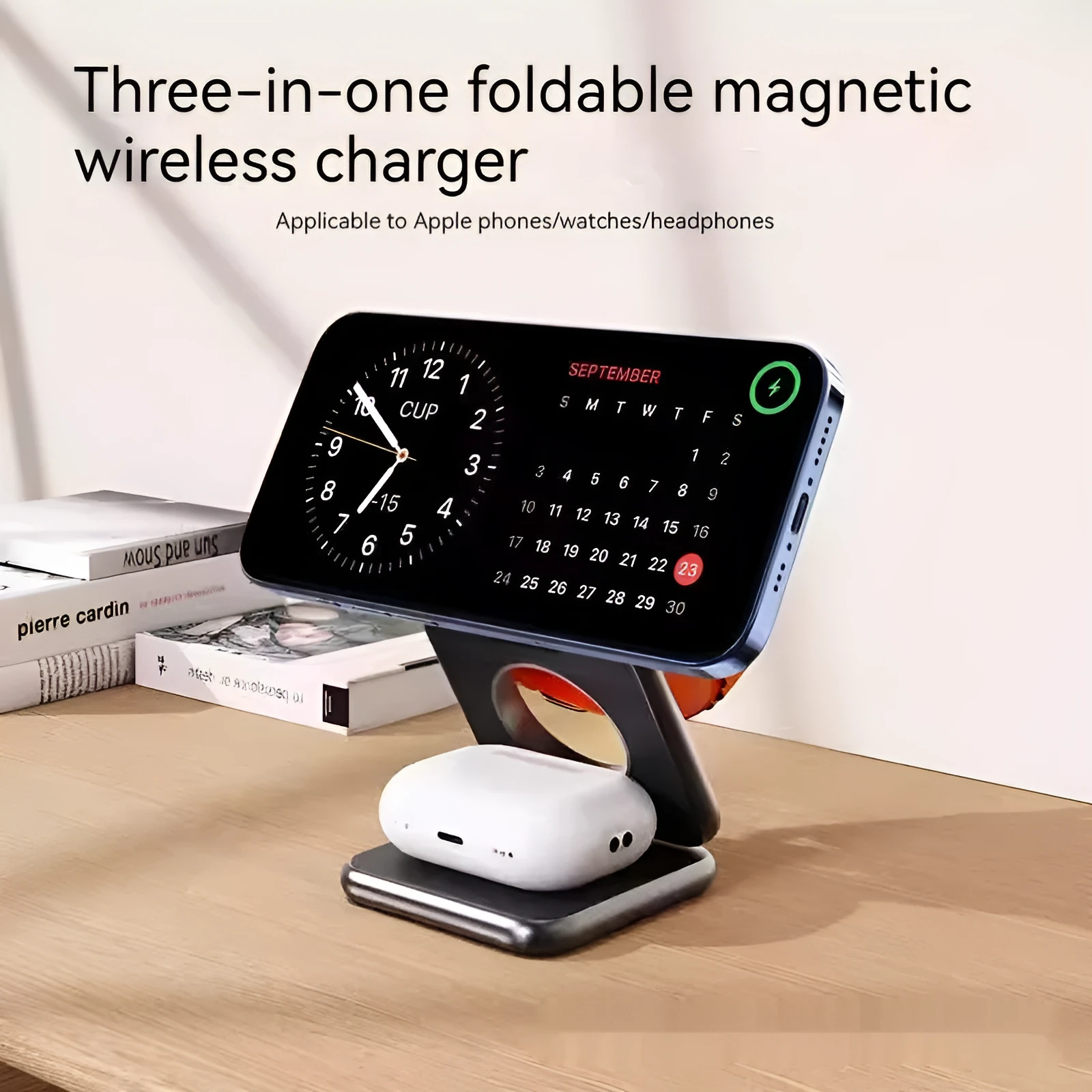 White foldable magnetic wireless charger and phone holder on a desk
