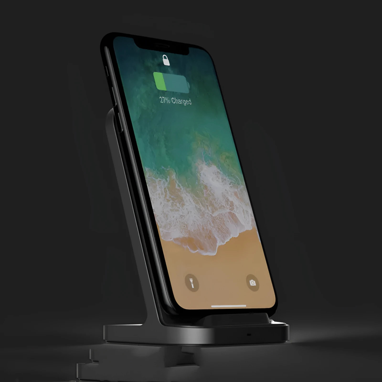 Dark grey vertical wireless charging stand for Apple iPhones on a desk