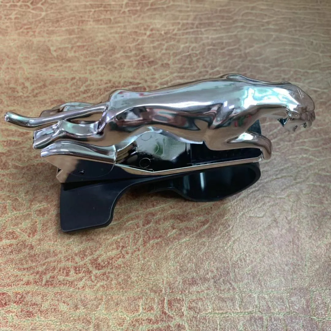 Rotatable car mobile phone holder bracket in black finish mounted on a car dashboard.