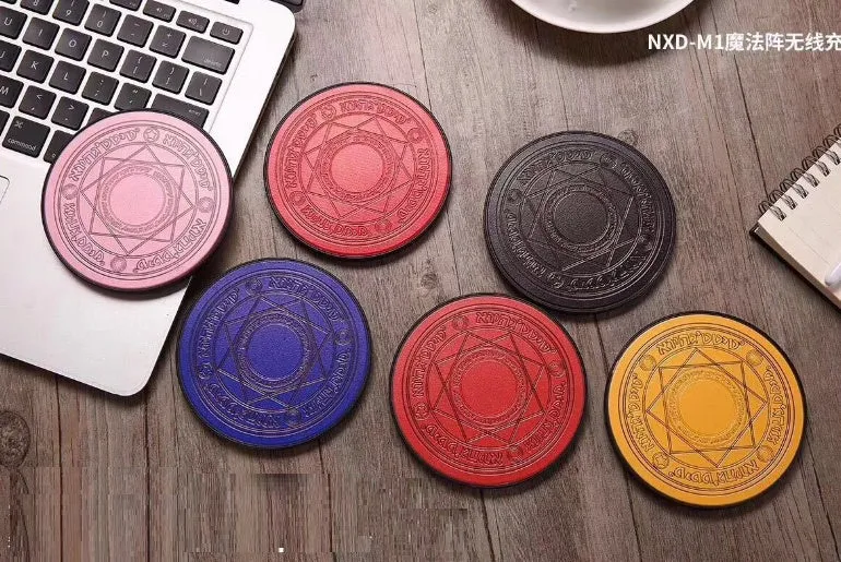 Mini Magic Array 10W wireless fast charger in multiple colours on a desk