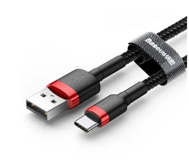 Grey and black woven nylon Android micro USB charging cable shown coiled with connector visible