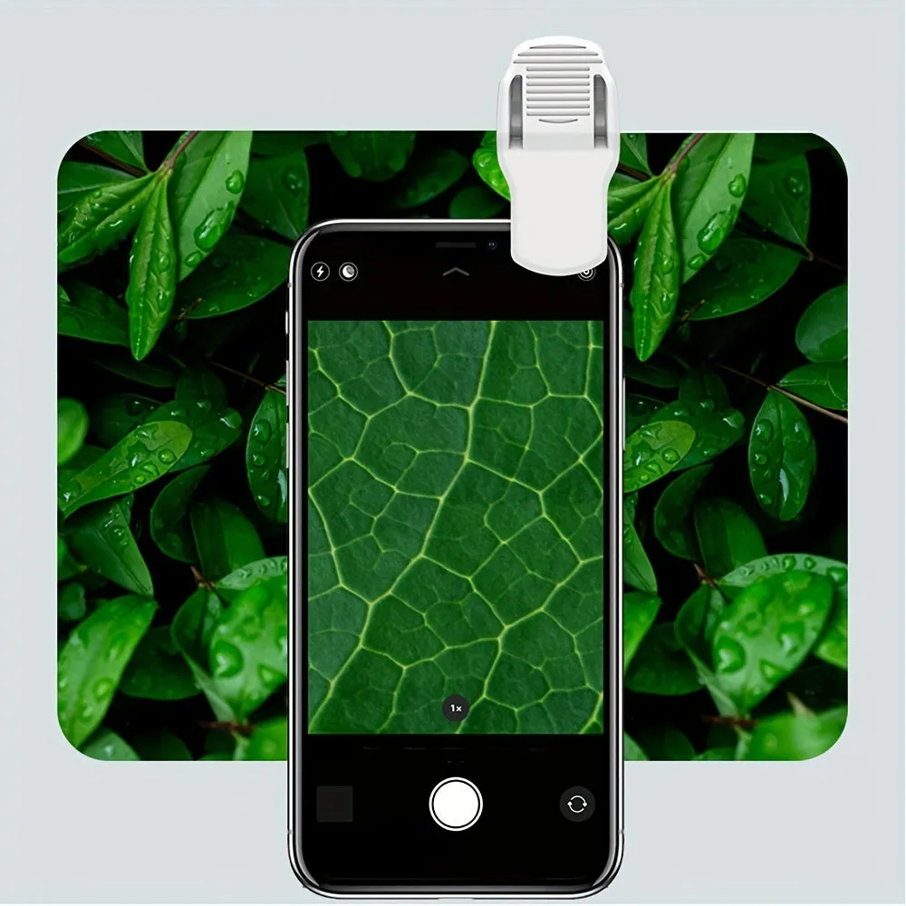 Mini mobile phone microscope with 60x magnification and LED light attached to smartphone
