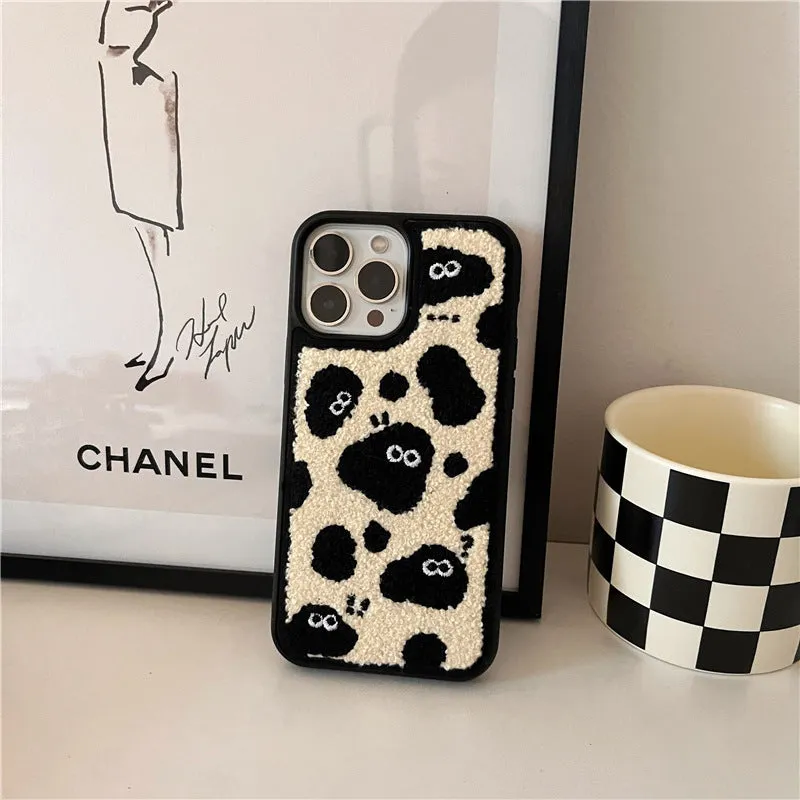 Black plush soft fairy design phone case for iPhone models.