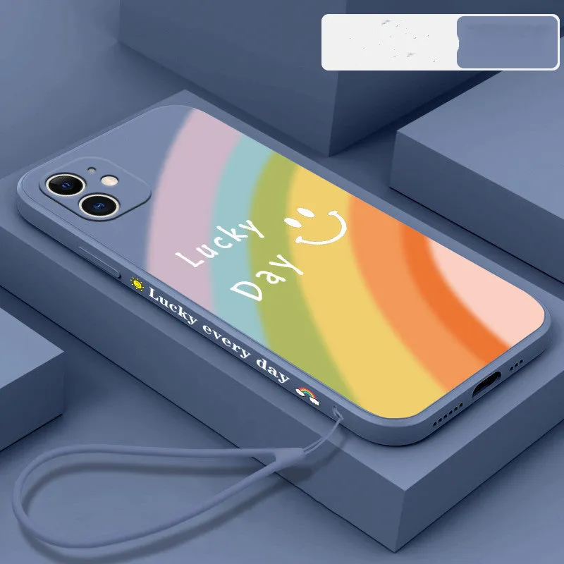 Rainbow smiley face silicone phone case for iPhone in blue, green, purple, and red colours.