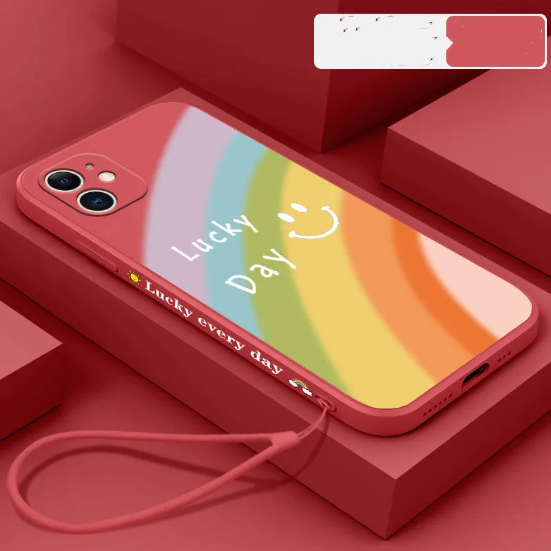 Rainbow smiley face silicone phone case for iPhone in blue, green, purple, and red colours.