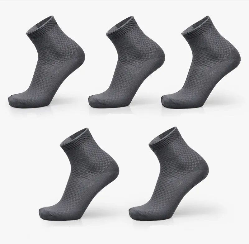 Pair of men's bamboo fibre business socks with small square pattern, shown in navy blue.