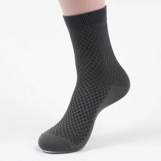 Pair of men's bamboo fibre business socks with small square pattern, shown in navy blue.