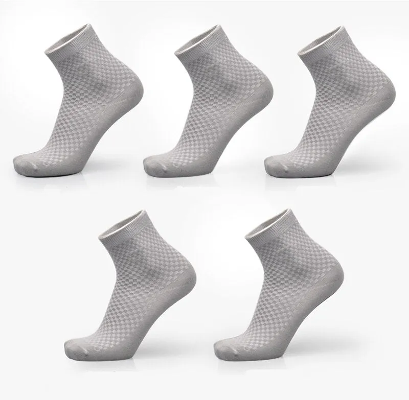 Pair of men's bamboo fibre business socks with small square pattern, shown in navy blue.