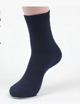 Pair of men's bamboo fibre business socks with small square pattern, shown in navy blue.