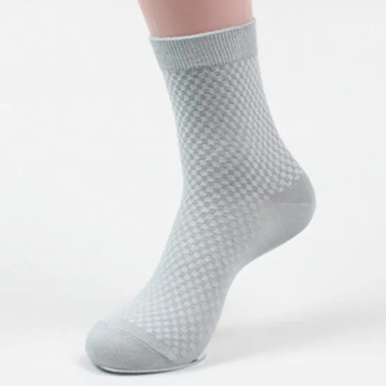 Pair of men's bamboo fibre business socks with small square pattern, shown in navy blue.