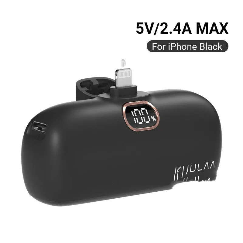 Compact cylindrical alloy power bank with built-in Lightning charging cable showing LCD display.