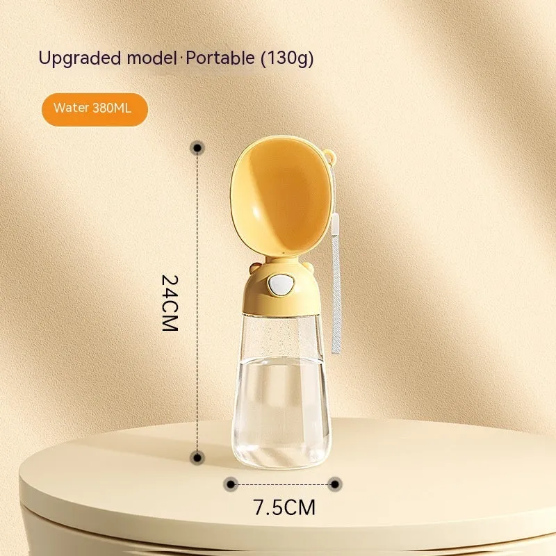 Yellow portable dog water bottle and feeder bowl for outdoor travel