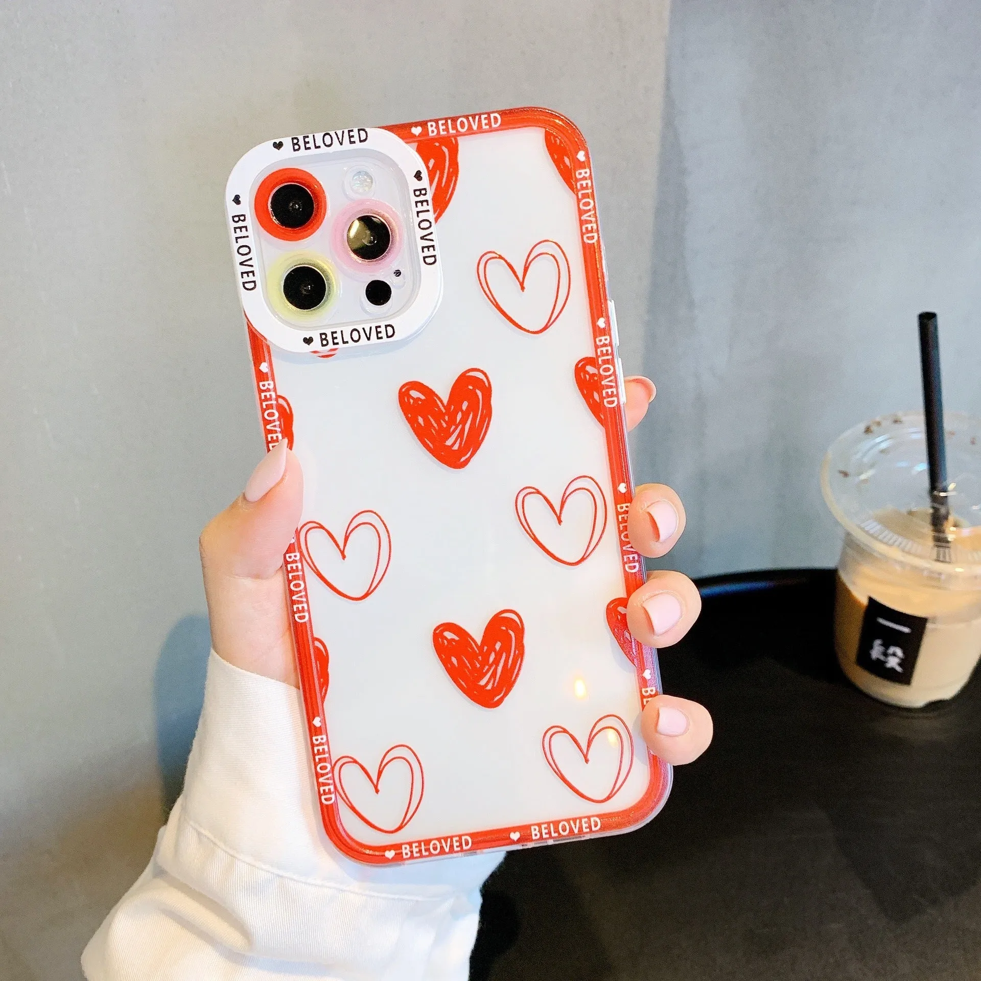 Pink mobile phone case with love heart and angel eyes design for iPhone.